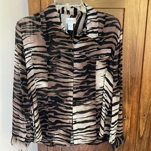 Gorgeous Animal Print Silk blouse to compliment your outfit.